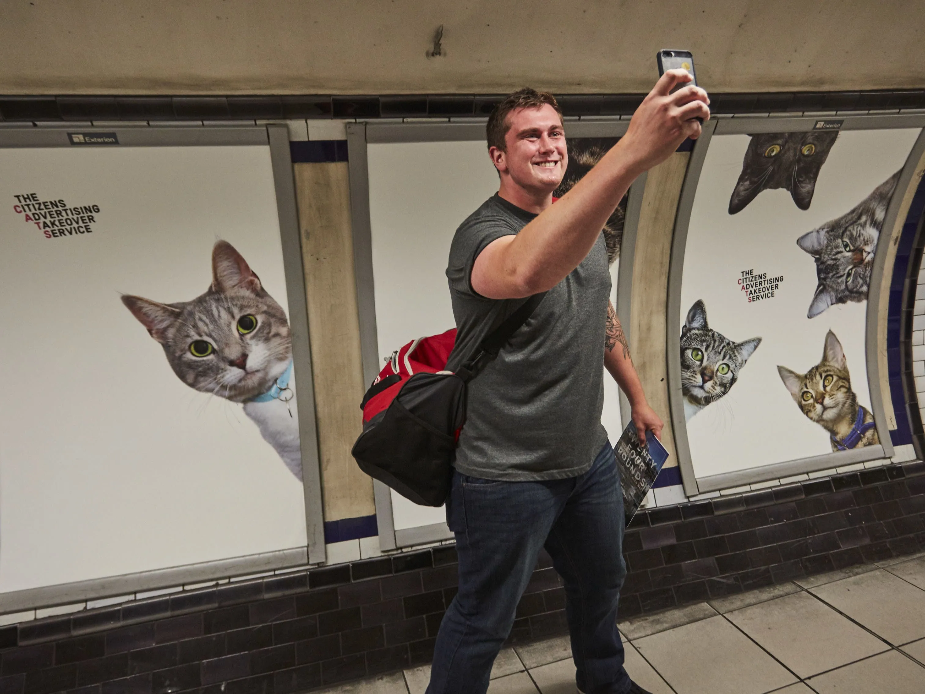 Clapham Common tube station covered in cat posters